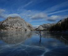 Image of an ice skater on Tenaya Lake